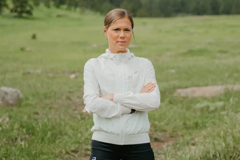 ASICS Athlete in running gear.