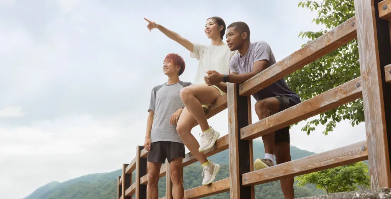 ASICS Models Standing Outside.