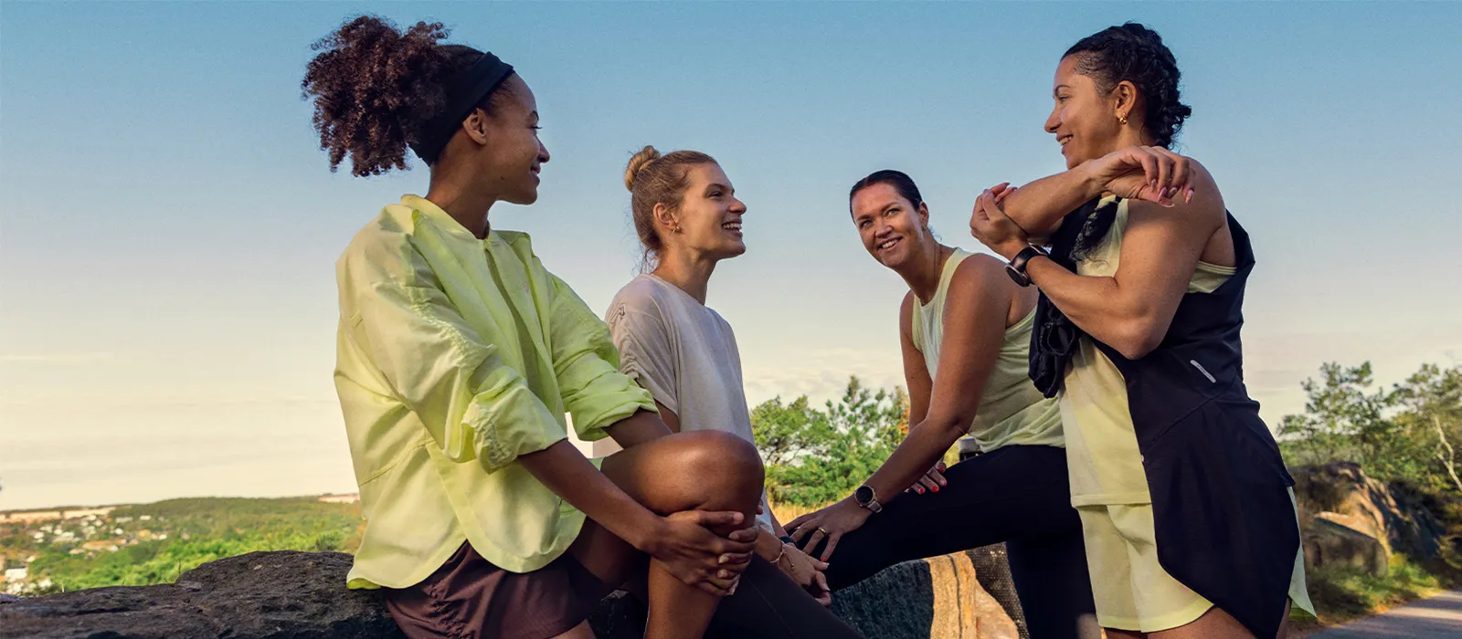 ASICS Athletes stretching after a workout.