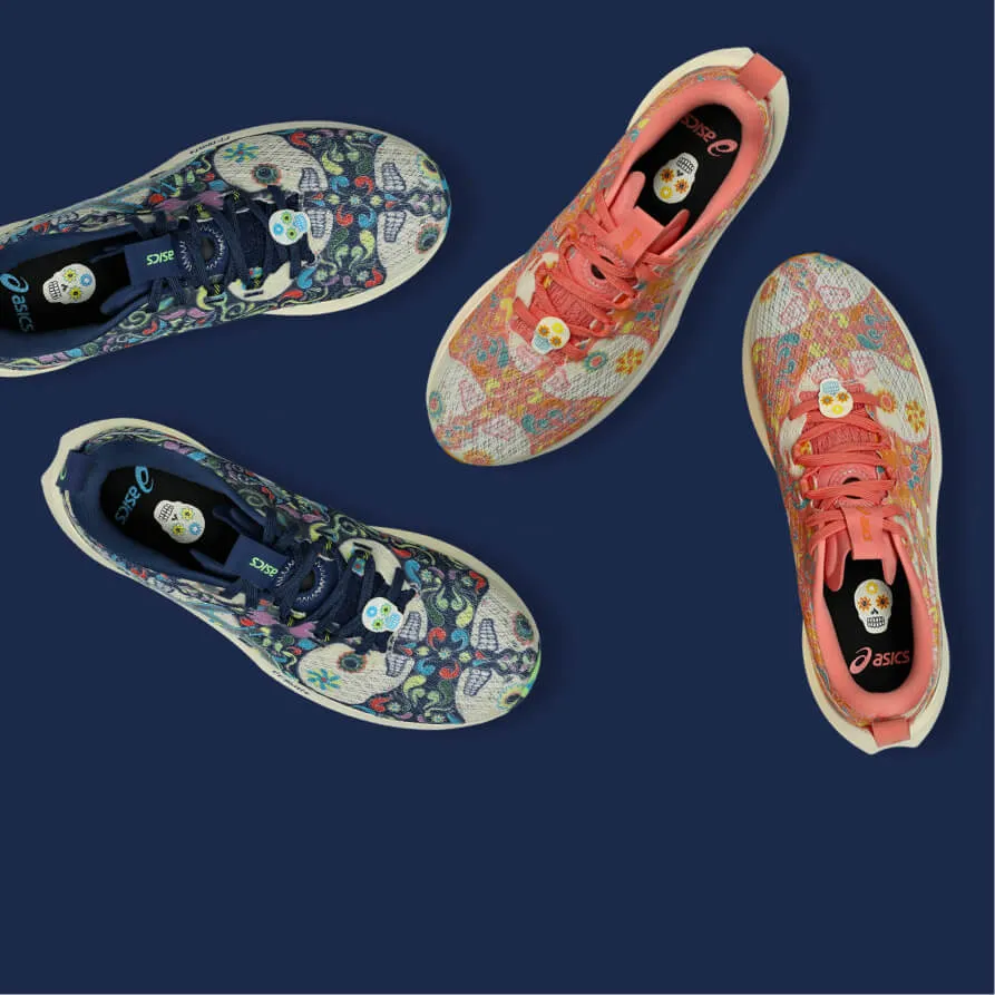 ASICS Noosa Tri sneakers in blue and orange on a blue background